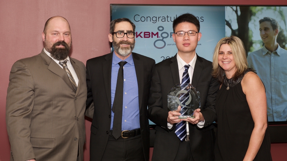 Team holding award