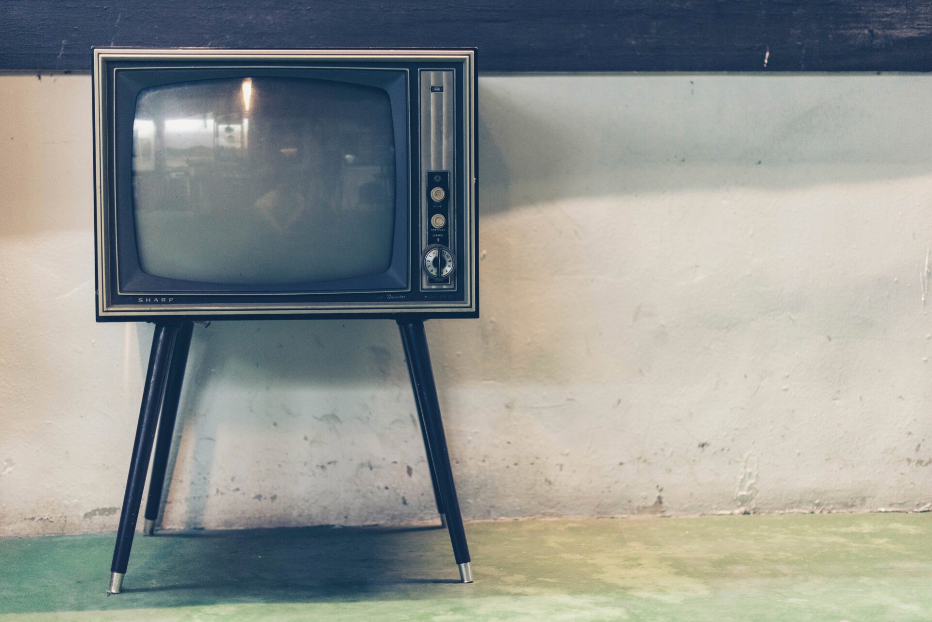 Vintage television on stand